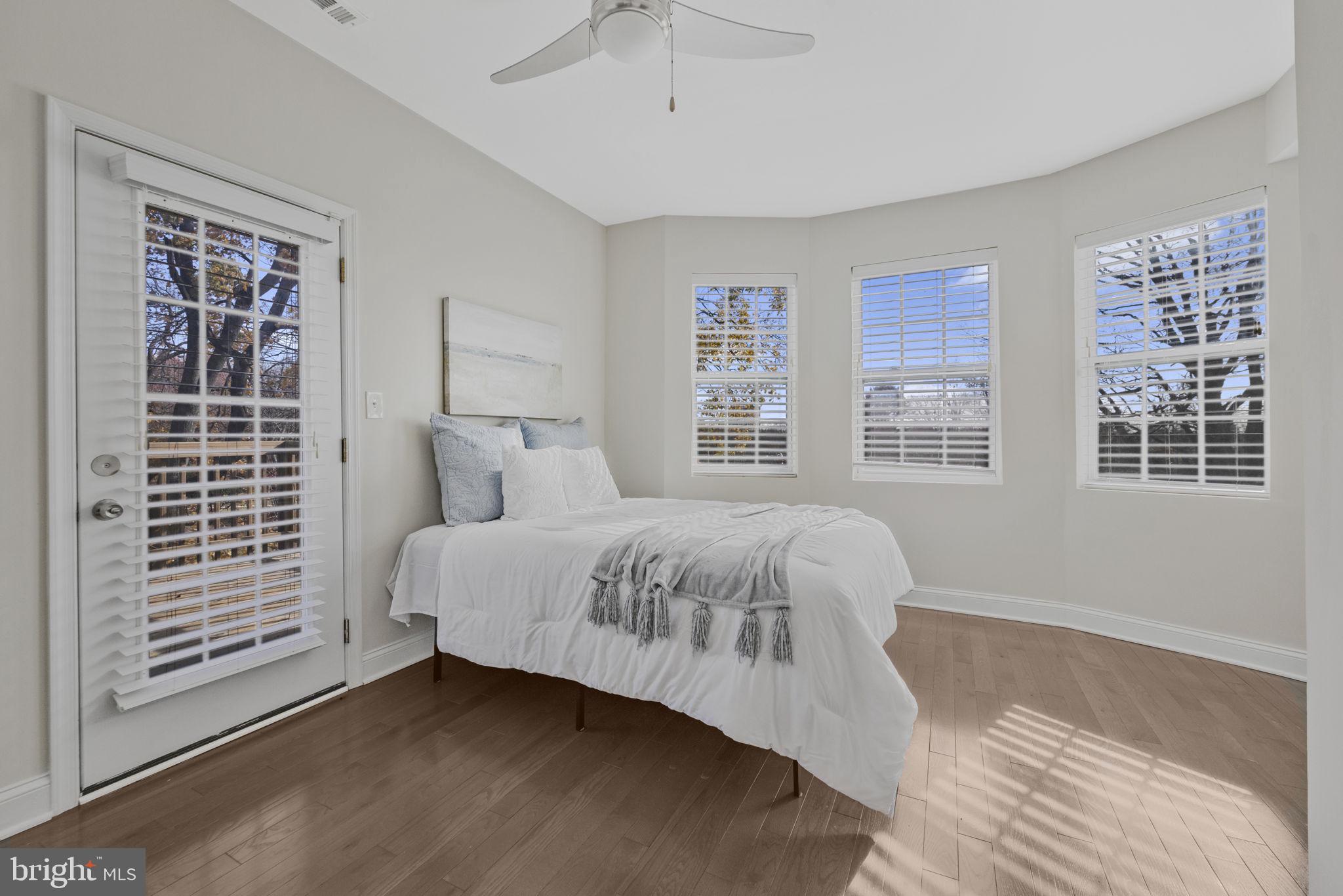 2420 West Rogers Avenue Baltimore, MD 21209 - Photo 32 of 67 a bedroom with a bed and a window