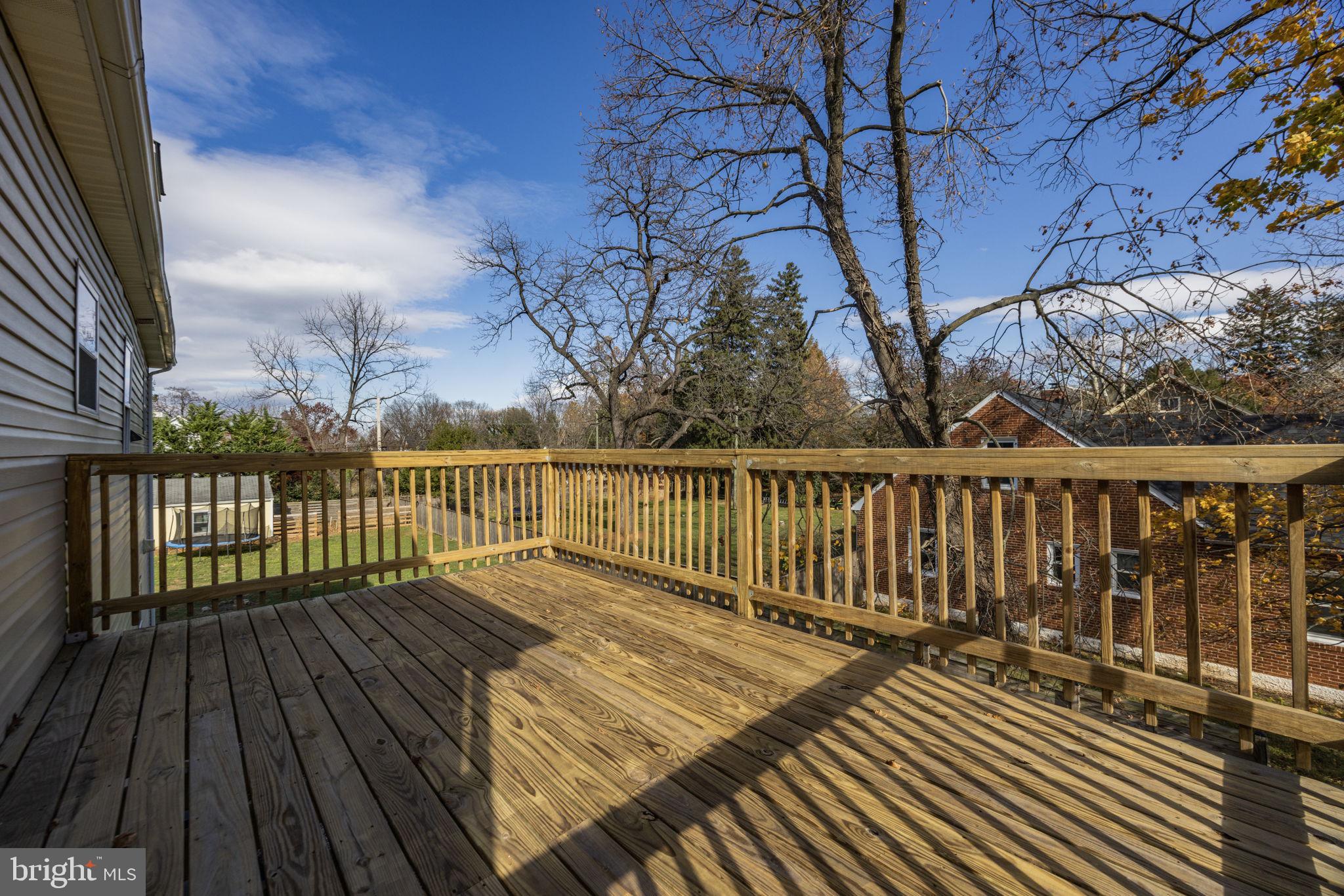 2420 West Rogers Avenue Baltimore, MD 21209 - Photo 35 of 67 a view of wooden balcony with wooden floor