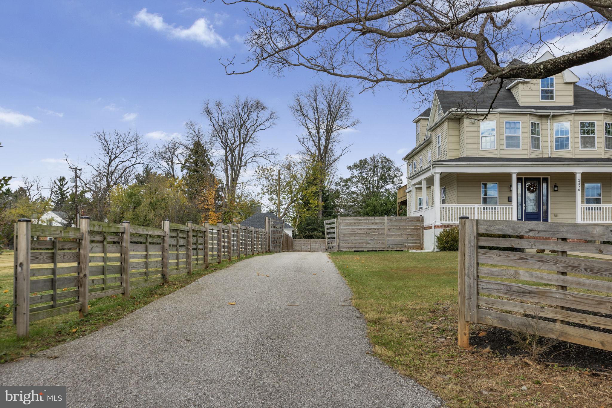 2420 West Rogers Avenue Baltimore, MD 21209 - Photo 54 of 67 a view of a house with a yard