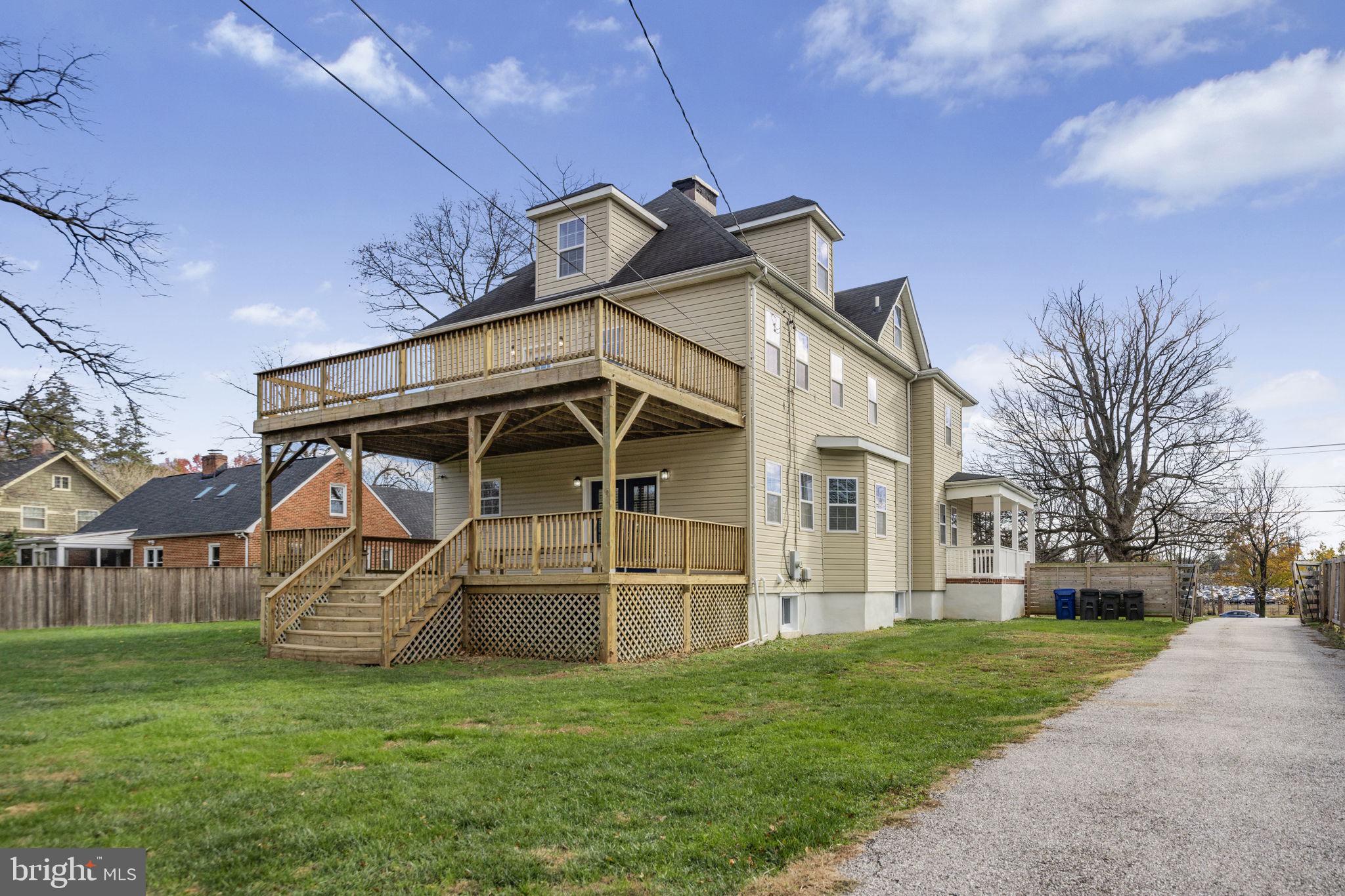 2420 West Rogers Avenue Baltimore, MD 21209 - Photo 55 of 67 a view of a house with a yard