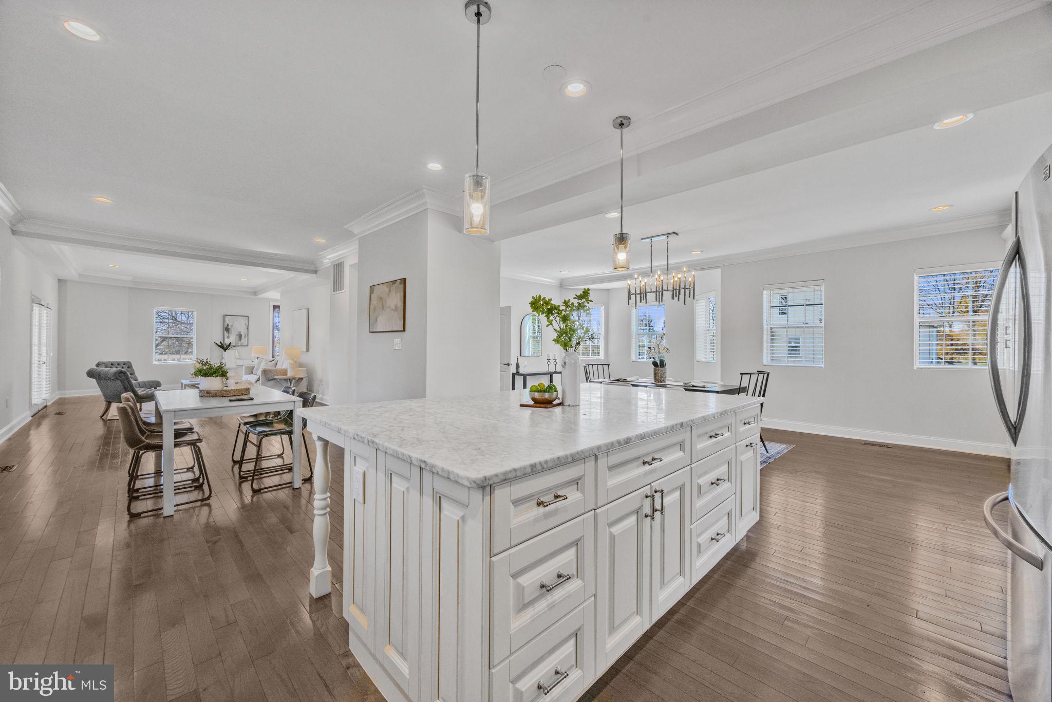 2420 West Rogers Avenue Baltimore, MD 21209 - Photo 7 of 67 a kitchen with counter top space and wooden floor