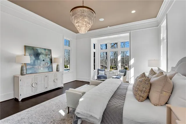 a large spacious bathroom with a large tub and sink