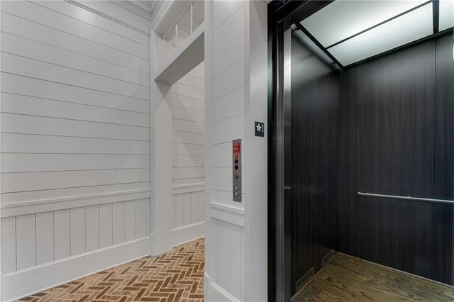 a view of a house with a large window