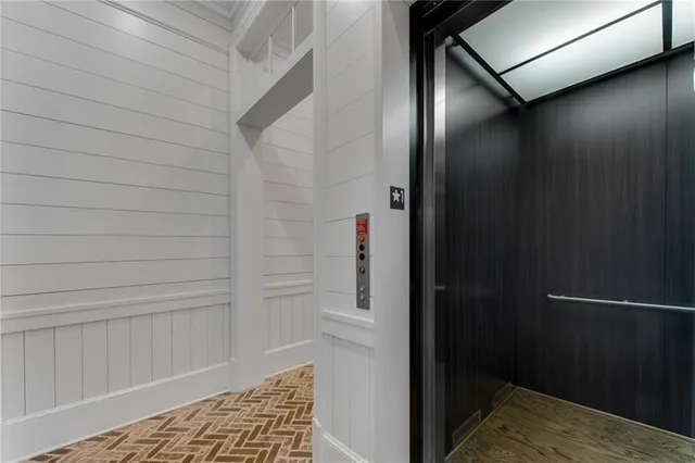 a view of a house with a large window