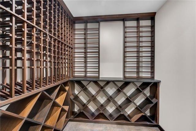 an aerial view of a house with outdoor space