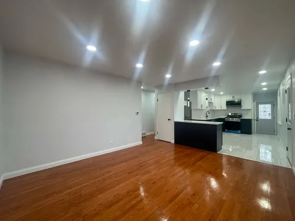 a view of a kitchen with a sink