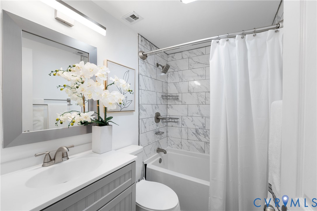 7 Millstone Road Henrico, VA 23228 - Photo 19 of 30 Full bathroom with vanity and shower / bath combo