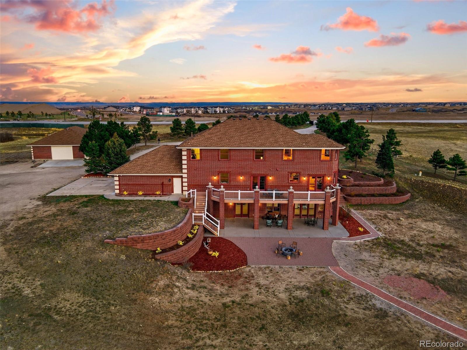 4347 Crowfoot Valley Road Castle Rock, CO 80108 - Photo 35 of 50 an aerial view of a house with a yard