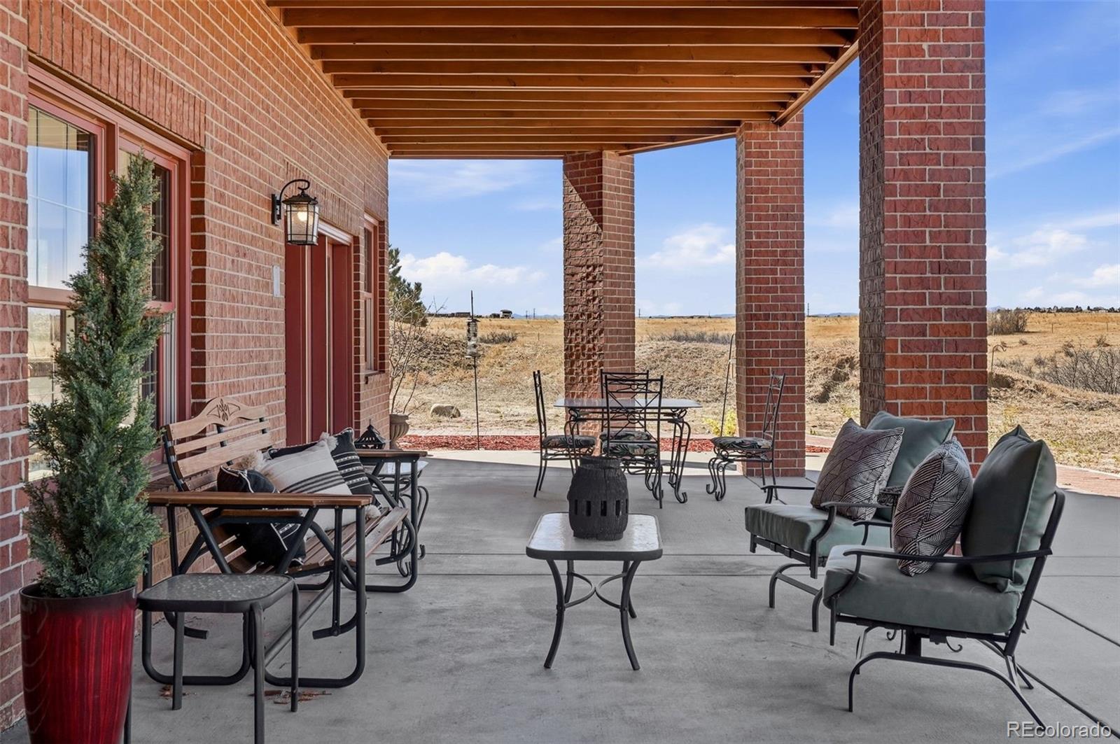 4347 Crowfoot Valley Road Castle Rock, CO 80108 - Photo 37 of 50 a building outdoor space with patio furniture