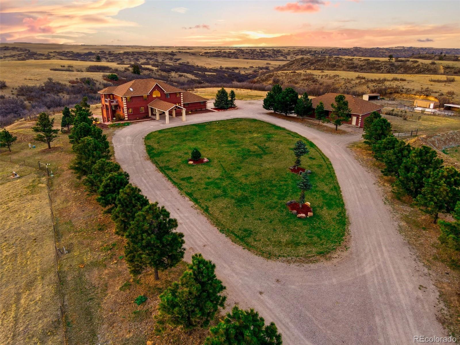 4347 Crowfoot Valley Road Castle Rock, CO 80108 - Photo 4 of 50 an aerial view of residential houses with outdoor space