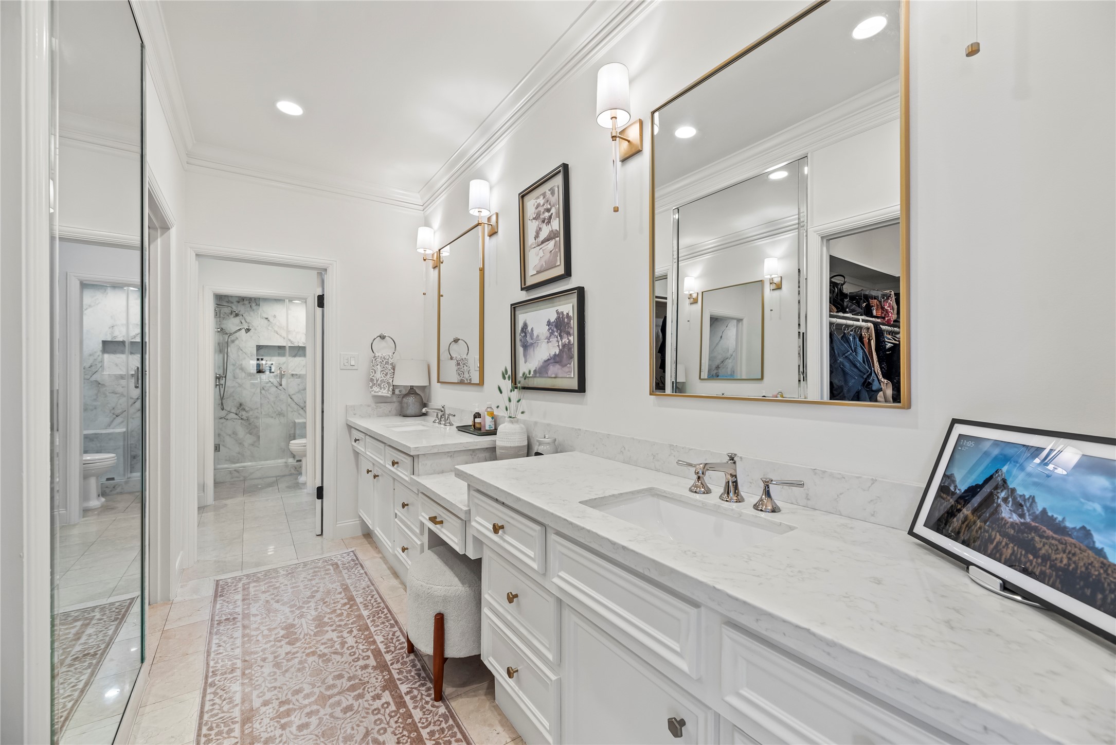 987 South Post Oak Lane Houston, TX 77056 - Photo 27 of 46 a bathroom with a double vanity sink mirror and double