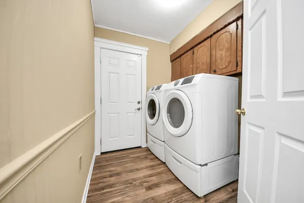 a utility room with dryer and washer