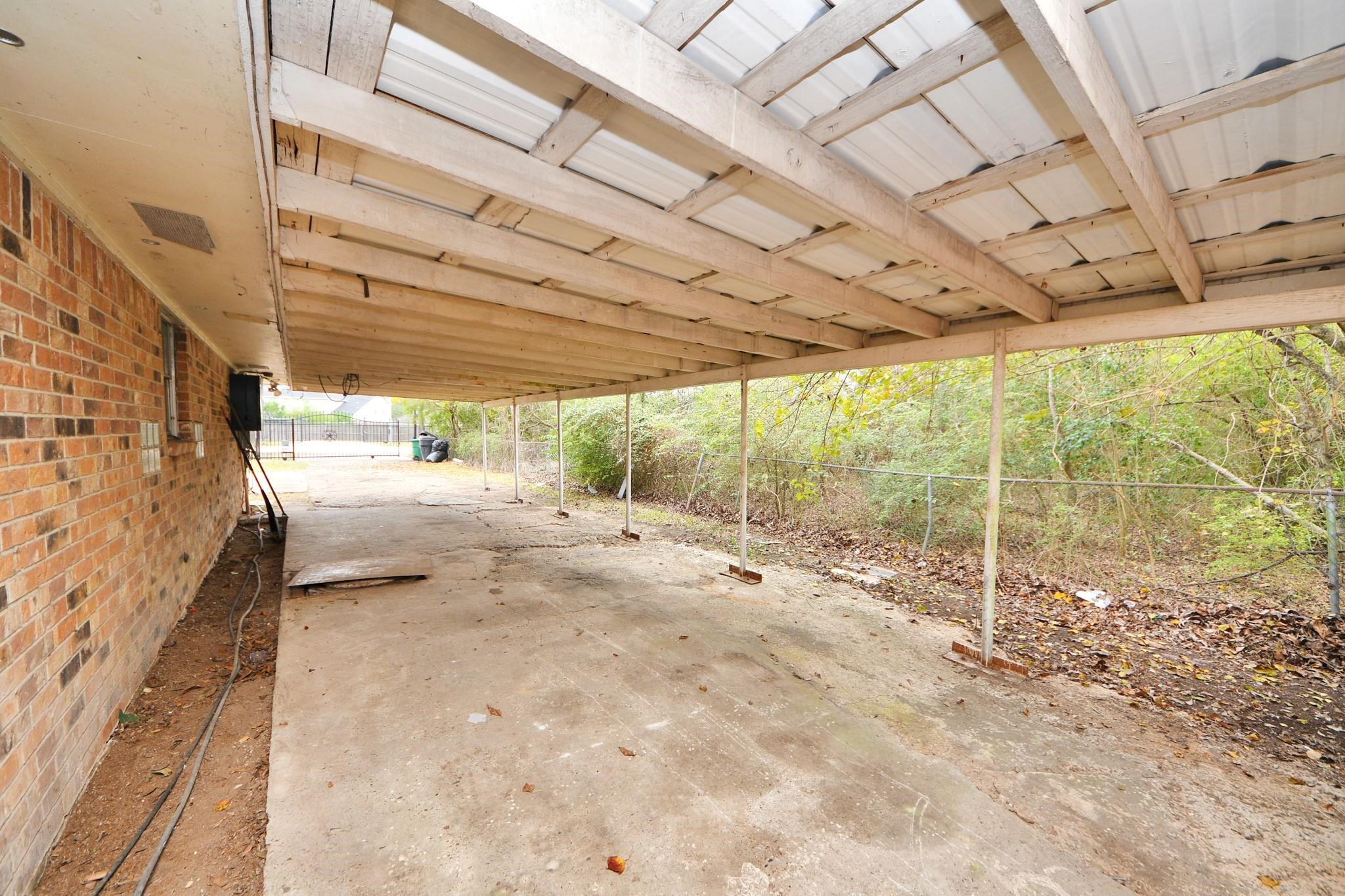 13610 Furman Road Houston, TX 77047 - Photo 21 of 25 a view of a room with wooden walls