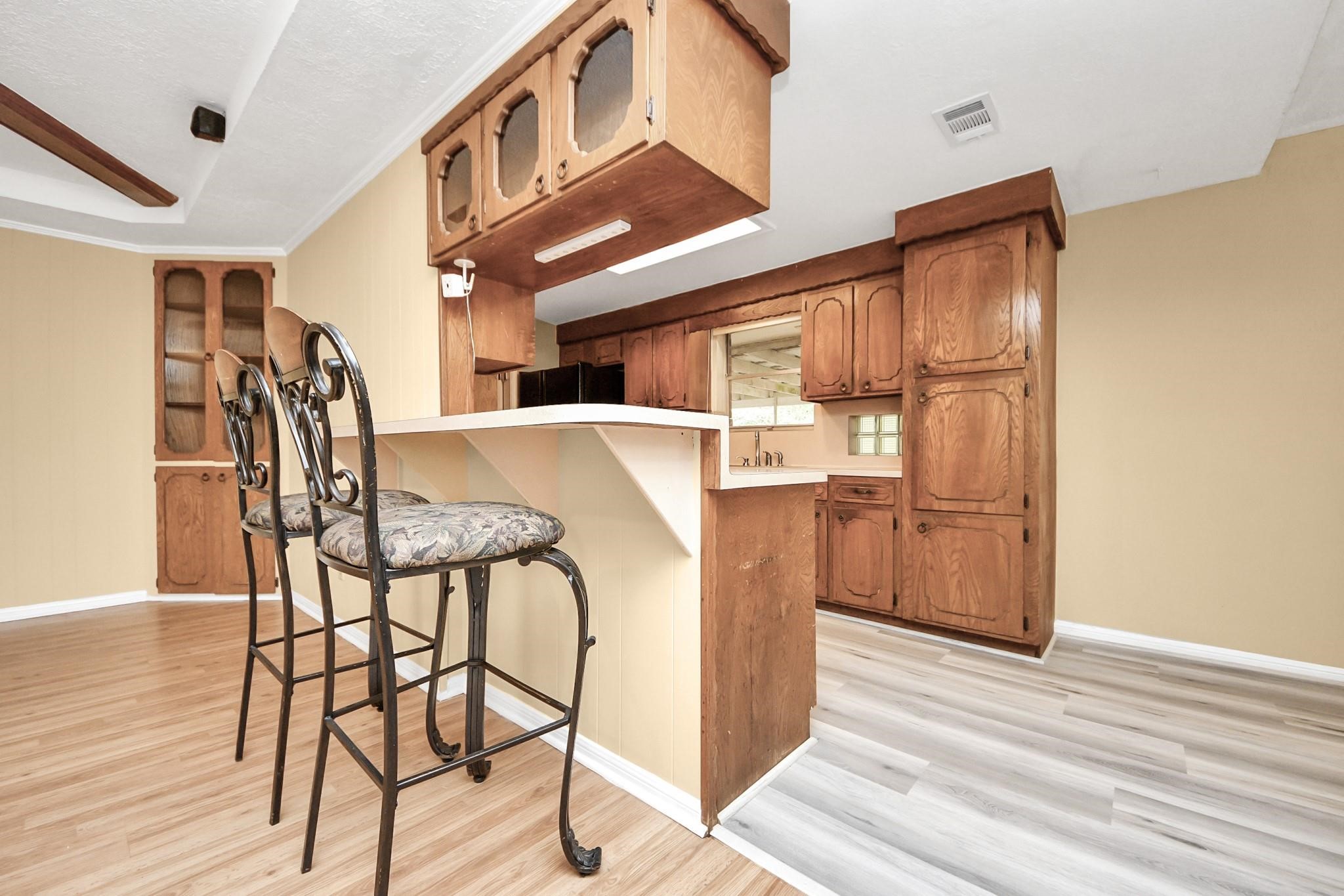 13610 Furman Road Houston, TX 77047 - Photo 8 of 25 a view of a dining room with furniture and wooden floor