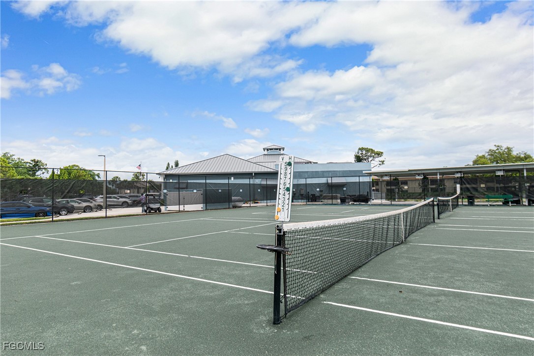 5905 Trailwinds Drive, Unit 824 Fort Myers, FL 33907 - Photo 47 of 50 a view of a tennis court