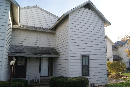 711 Wakefield Road, Unit 711 Gurnee, IL 60031 - Photo 1 of 1 a front view of a house with a yard