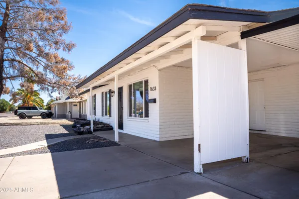 a view of a house with a patio