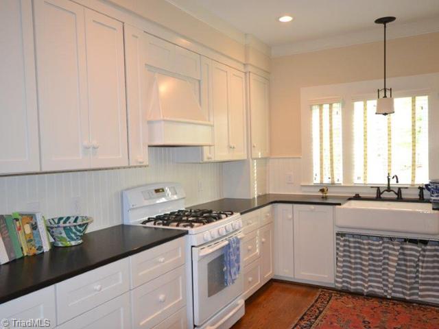 4784 Little Fox Road Randleman, NC 27317 - Photo 8 of 16 Kitchen. Granite Countertops, Hardwood Floors, Farm House Sink