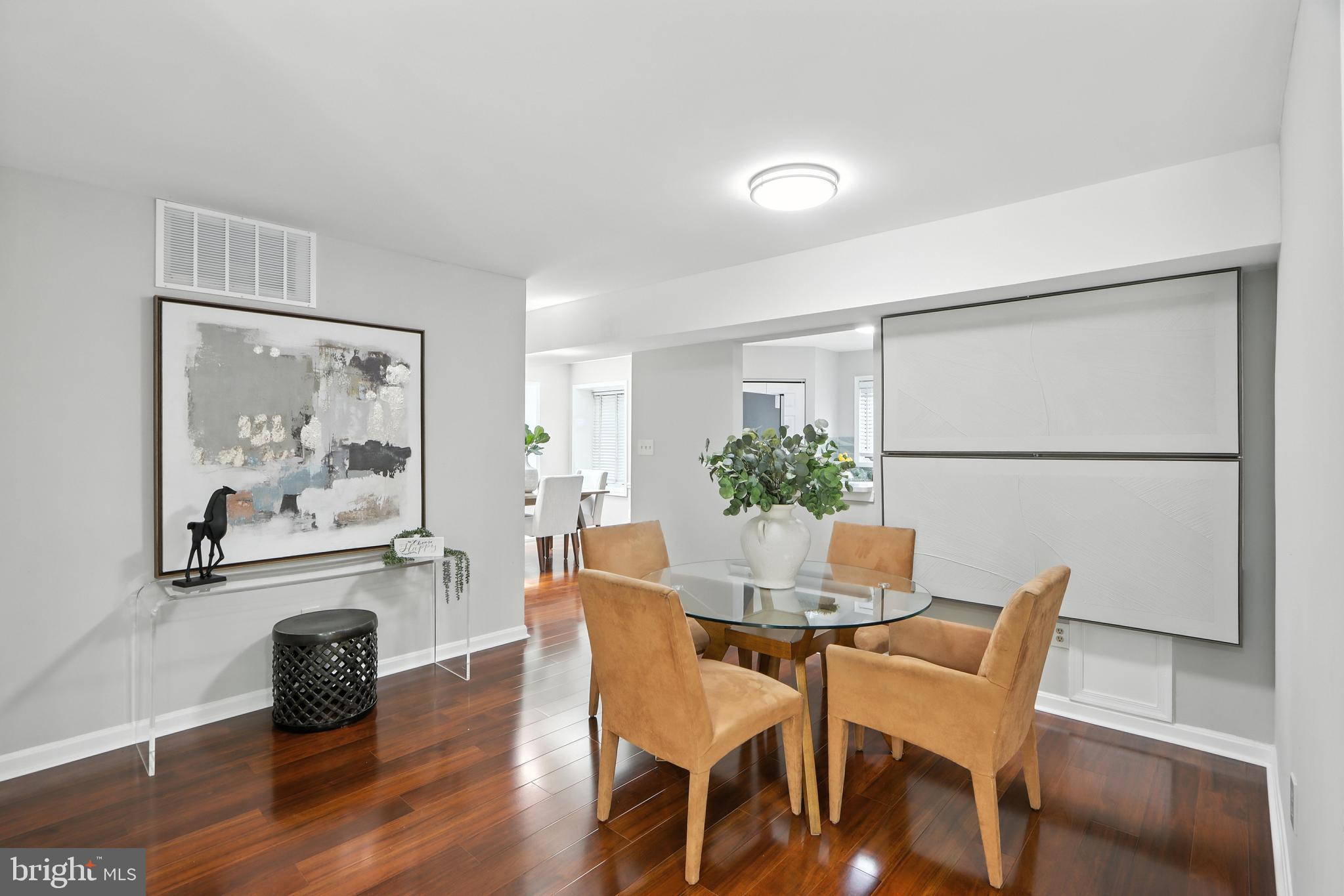 3005 Courtside Road Bowie, MD 20721 - Photo 14 of 43 a dining room with furniture and wooden floor