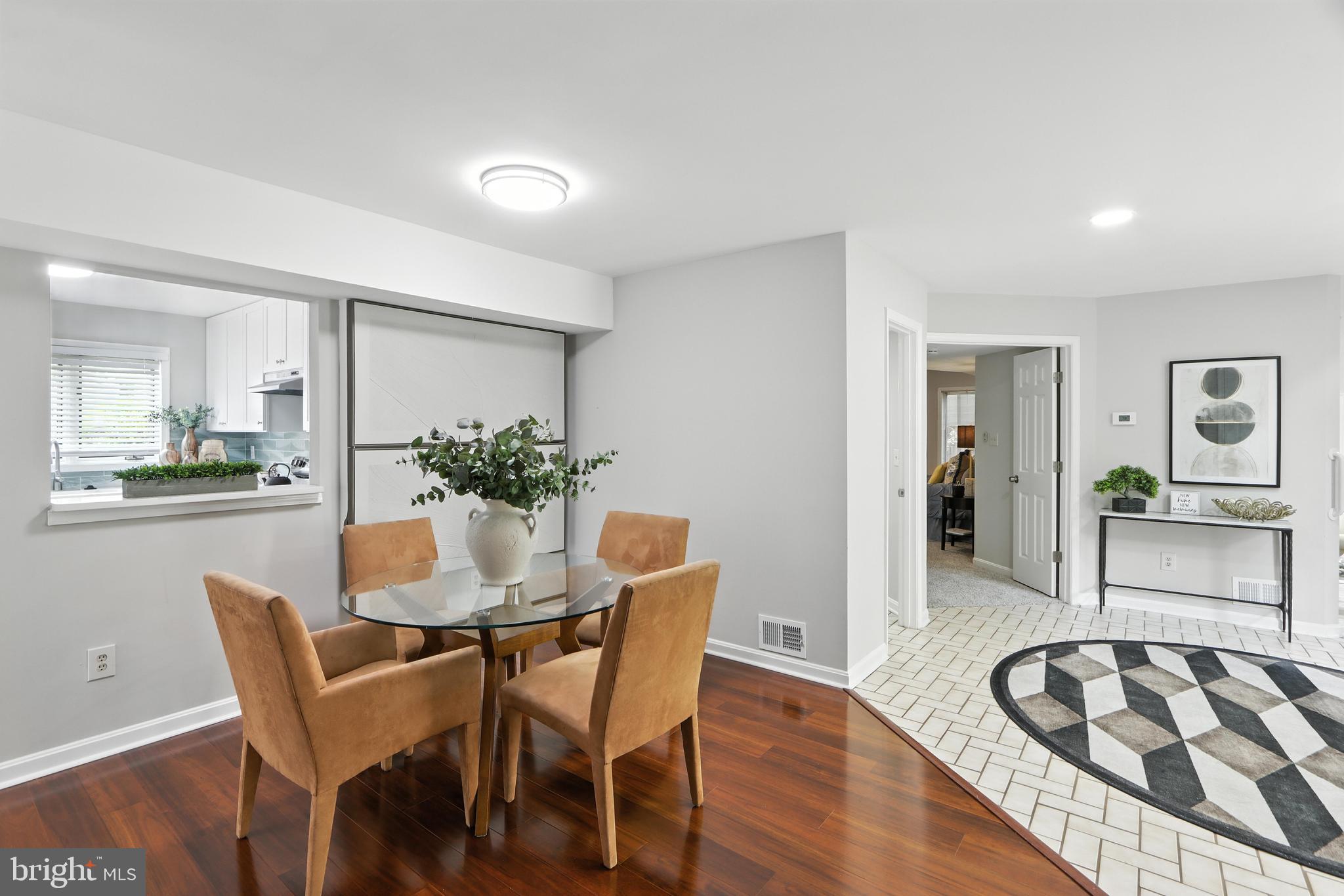 3005 Courtside Road Bowie, MD 20721 - Photo 15 of 43 a dining room with furniture and wooden floor