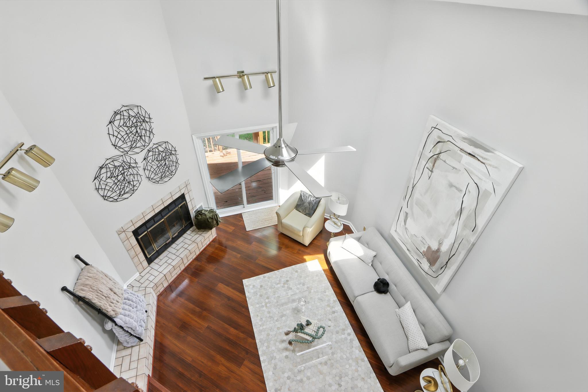 3005 Courtside Road Bowie, MD 20721 - Photo 23 of 43 a view of a livingroom with furniture and a fireplace