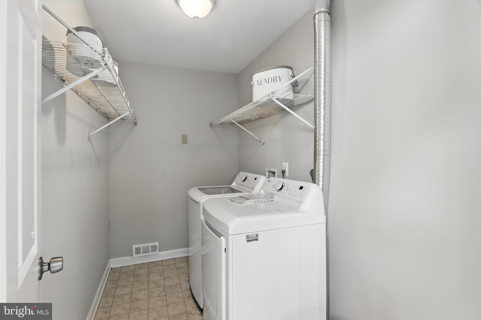 3005 Courtside Road Bowie, MD 20721 - Photo 24 of 43 a utility room with dryer and washer
