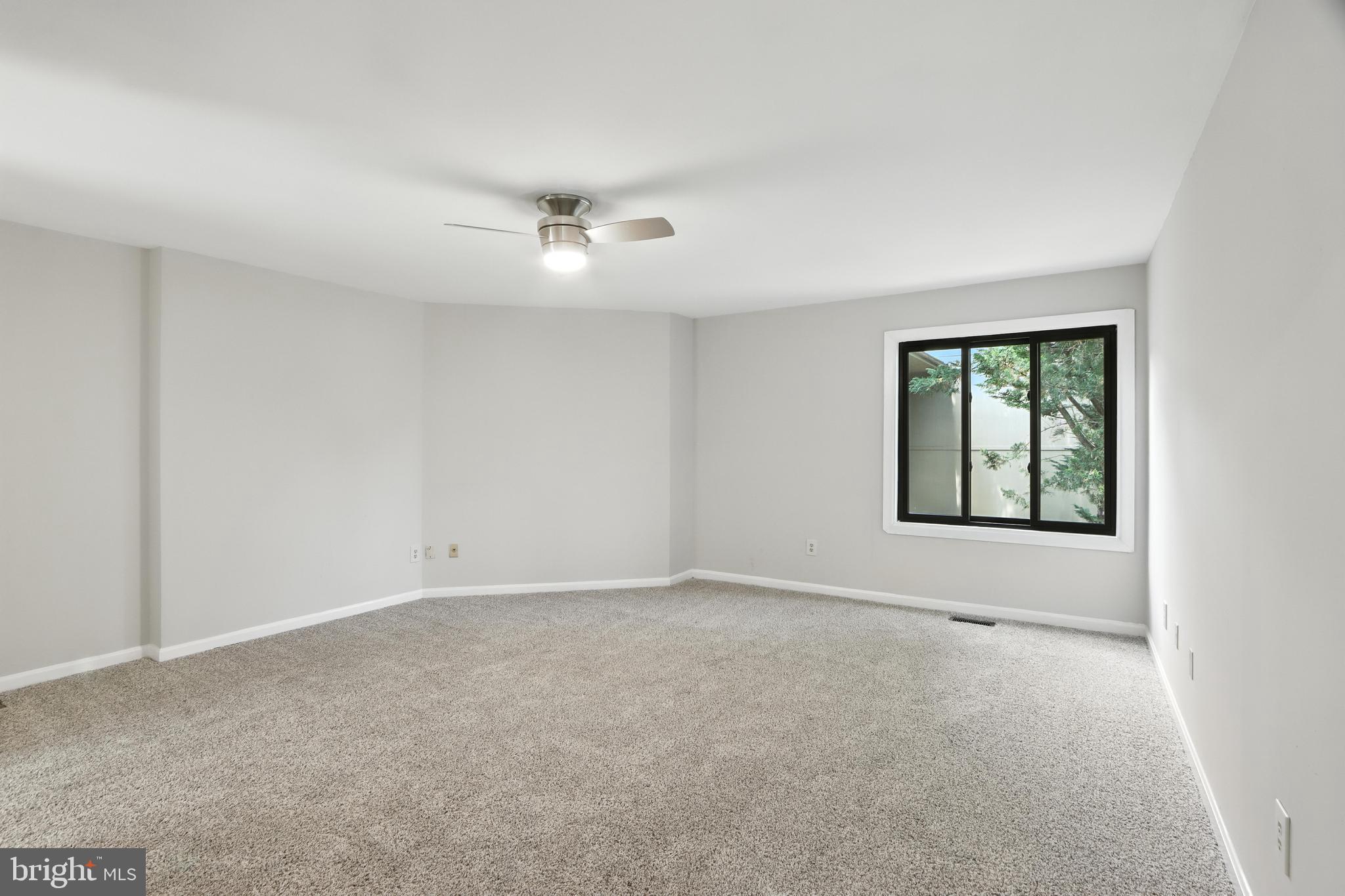 3005 Courtside Road Bowie, MD 20721 - Photo 25 of 43 a view of an empty room with a window
