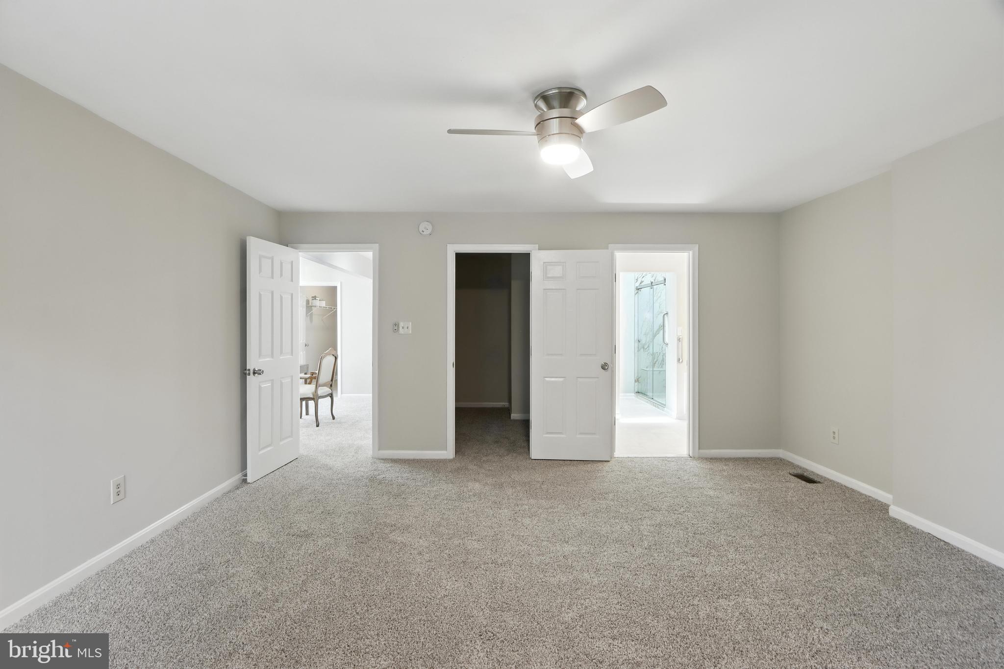 3005 Courtside Road Bowie, MD 20721 - Photo 26 of 43 a view of an empty room with a chandelier fan