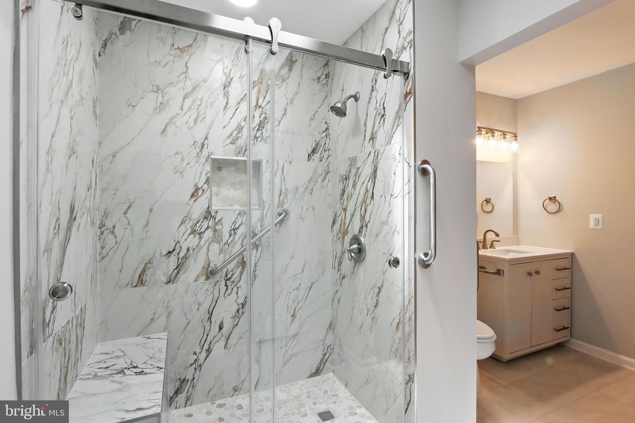 3005 Courtside Road Bowie, MD 20721 - Photo 28 of 43 a bathroom with a shower and a sink