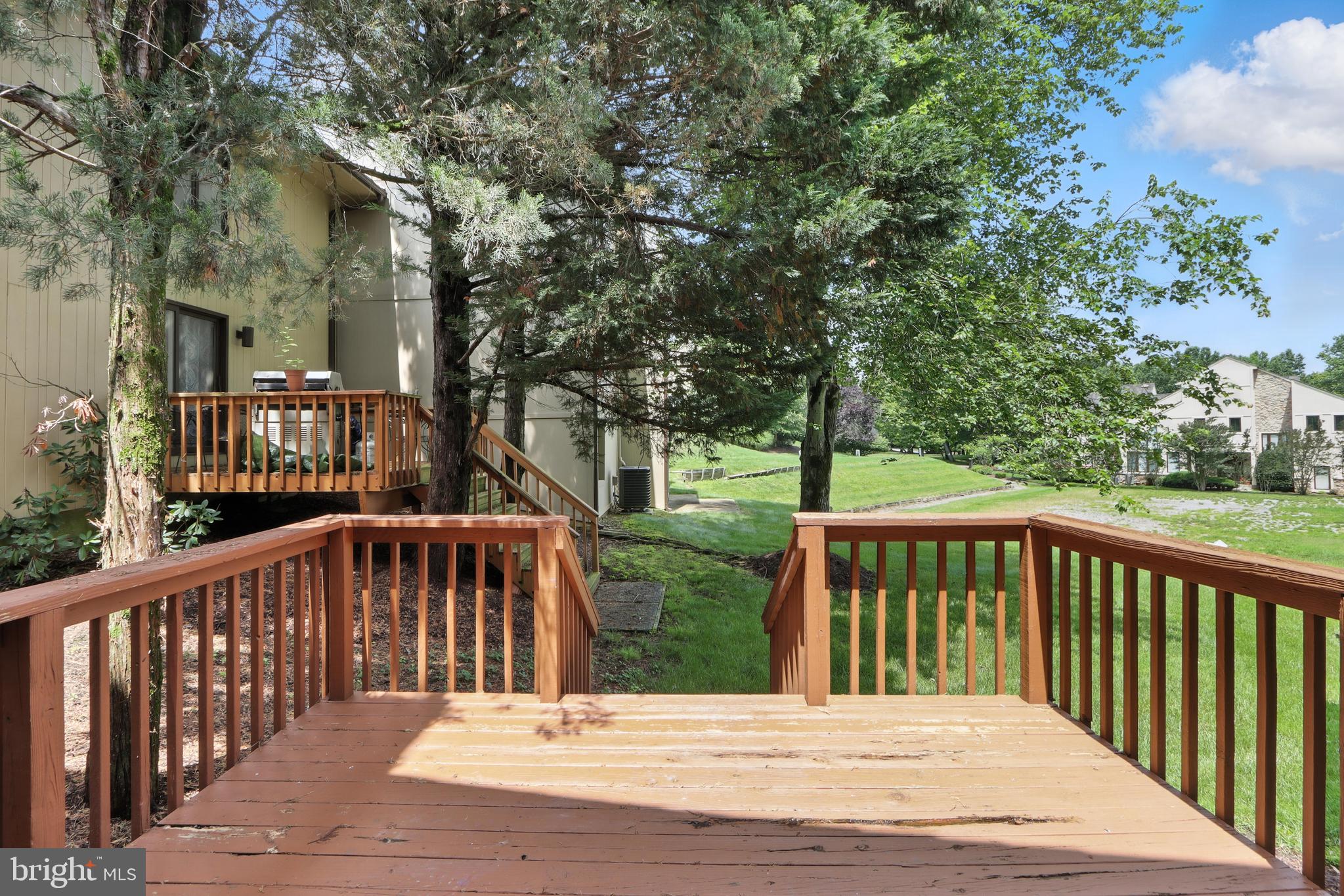 3005 Courtside Road Bowie, MD 20721 - Photo 34 of 43 a view of a wooden roof deck