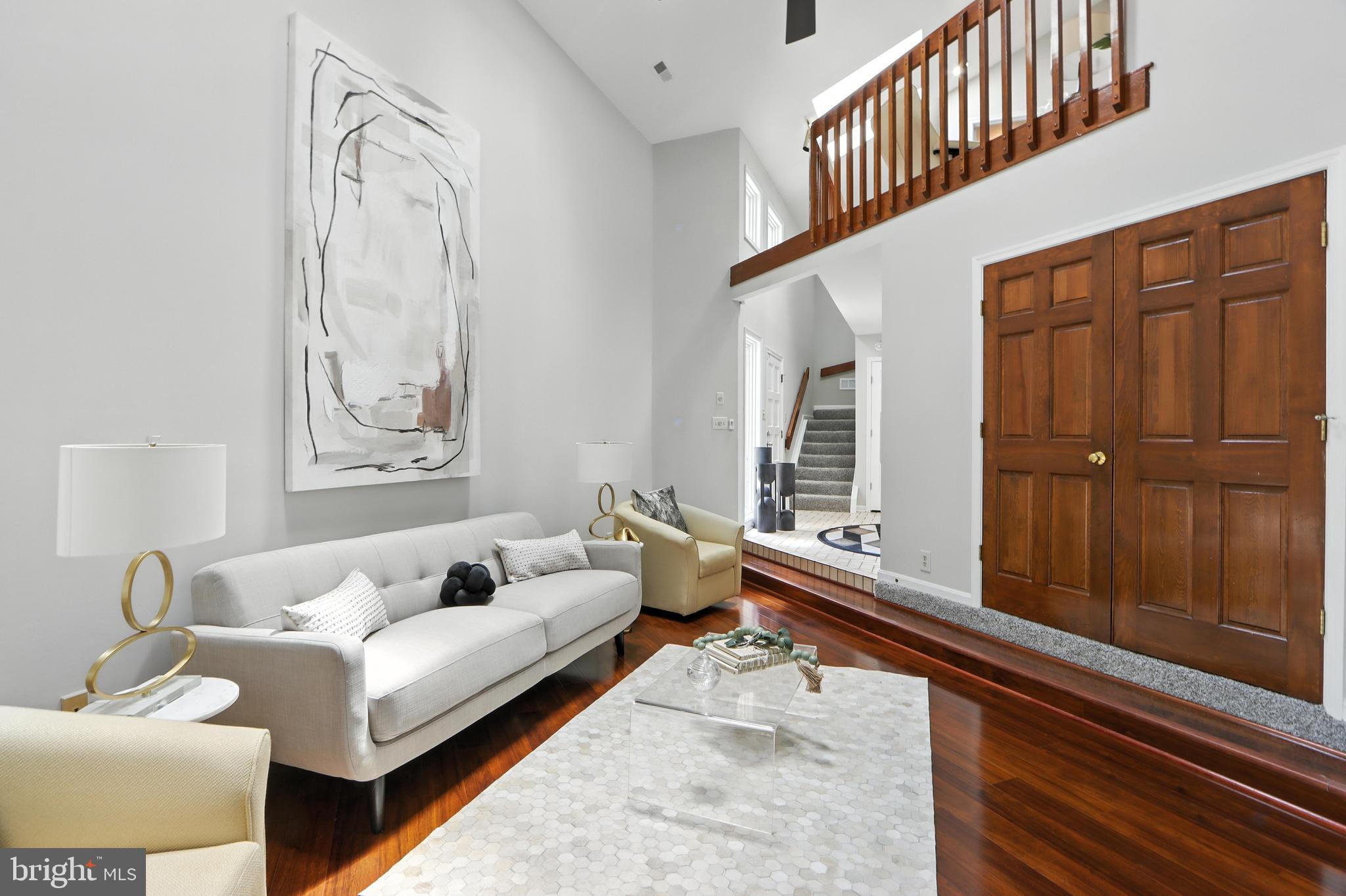 3005 Courtside Road Bowie, MD 20721 - Photo 7 of 43 a living room with furniture and a large window