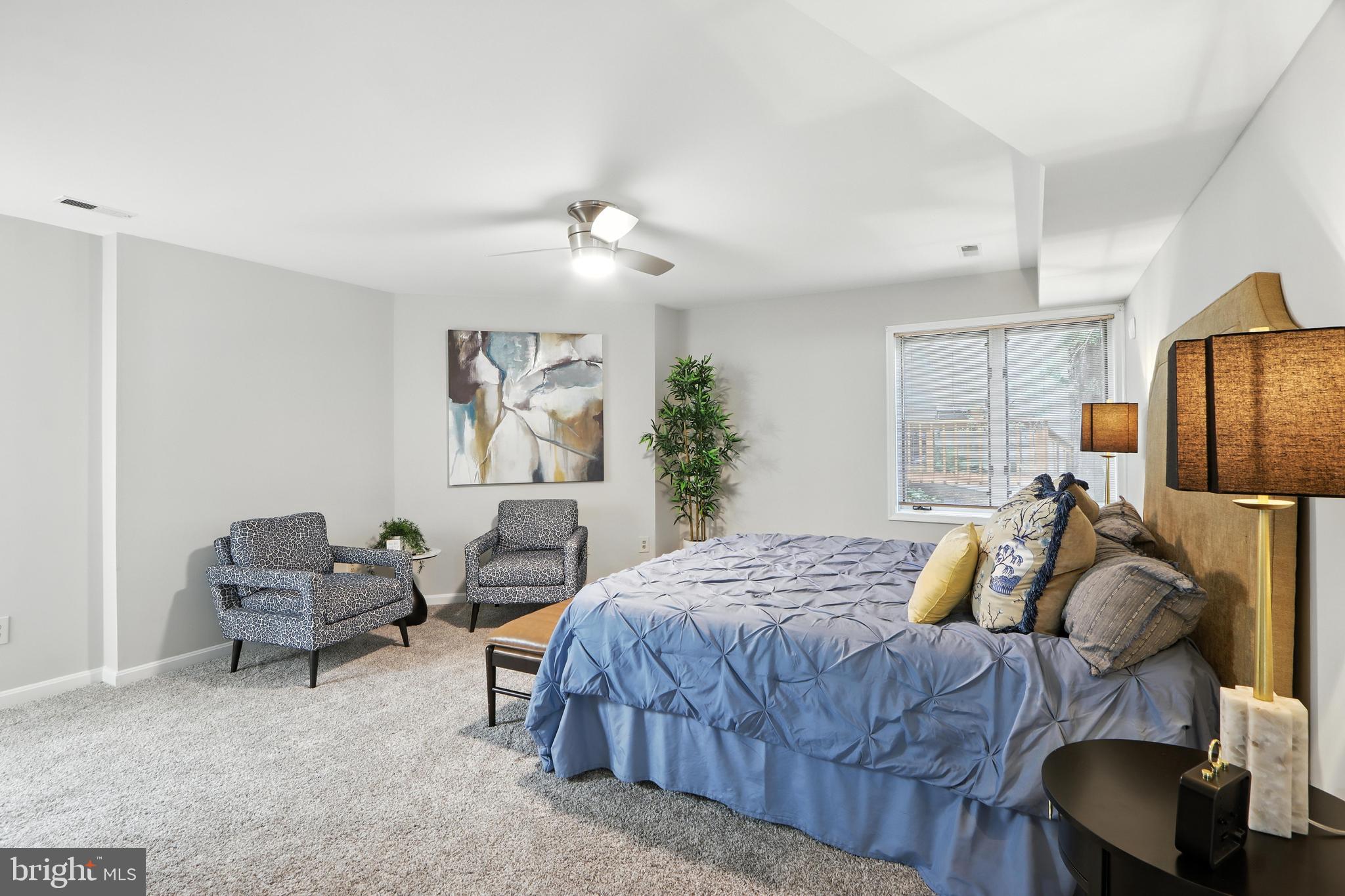 3005 Courtside Road Bowie, MD 20721 - Photo 9 of 43 a bedroom with furniture and a window