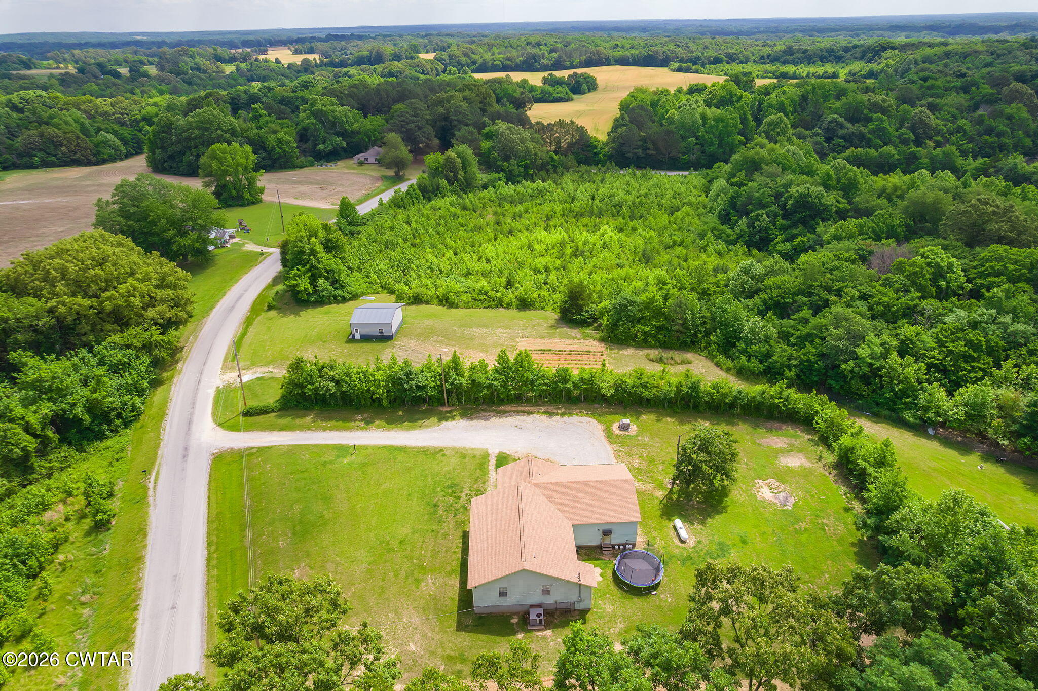 306 Jim Jackson Road Humboldt, TN 38343 - Photo 28 of 29 an aerial view of residential house with outdoor space and a swimming pool view