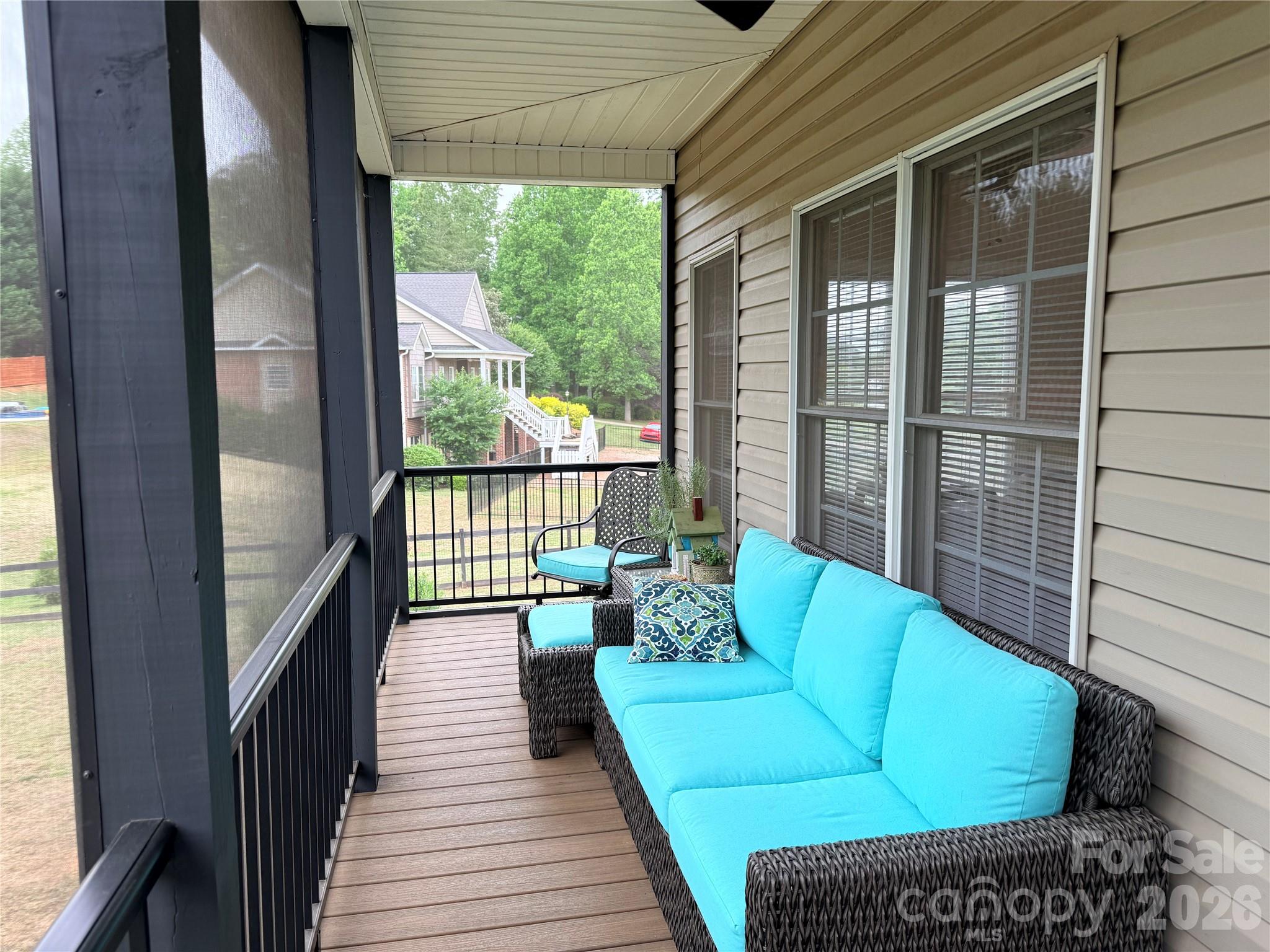 183 Burl Bridges Road Forest City, NC 28043 - Photo 27 of 31 a balcony with furniture and a potted plant