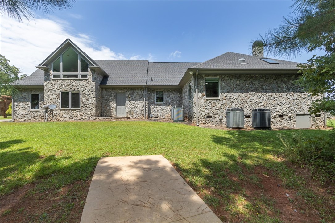 526 Broyles Point Road Townville, SC 29689 - Photo 50 of 50 Right side of house to dock