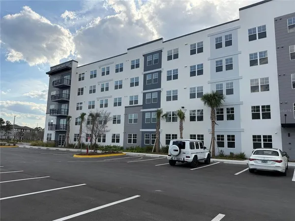 a view of a street with cars