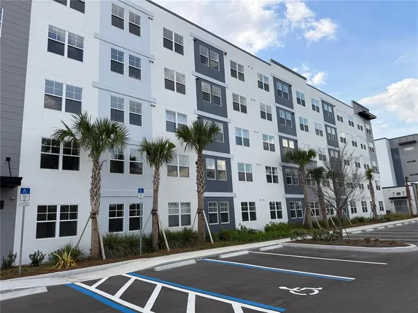 a view of a building with a street