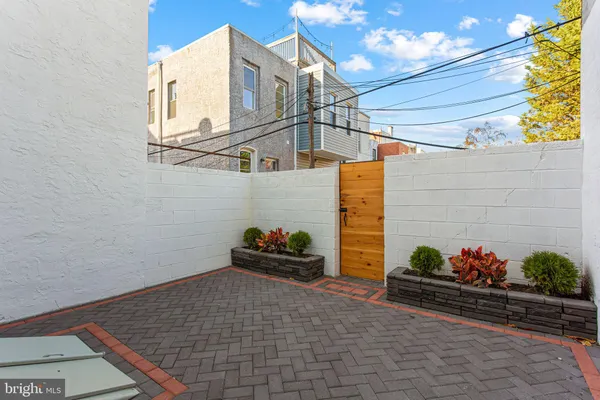 a house view with a potted plant