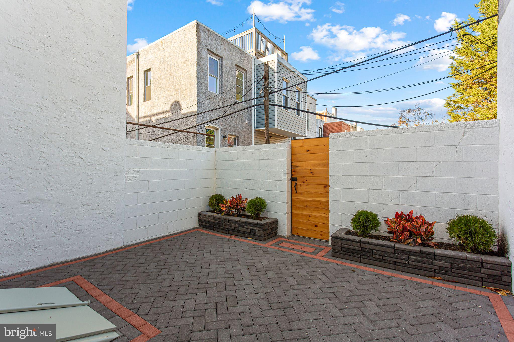 1419 Wharton Street Philadelphia, PA 19146 - Photo 12 of 39 a house view with a potted plant