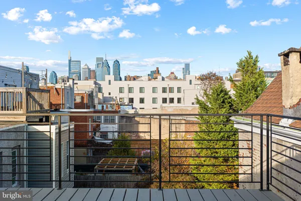 a balcony with a city view
