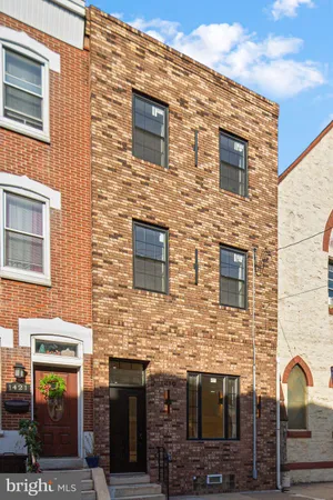 a brick building with a door