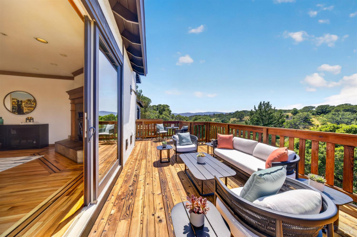 10 Lockton Lane Novato, CA 94945 - Photo 20 of 68 Spacious view deck with room for lounging and café seating, offering a peaceful setting for morning coffee, afternoon sun, and outdoor dining.