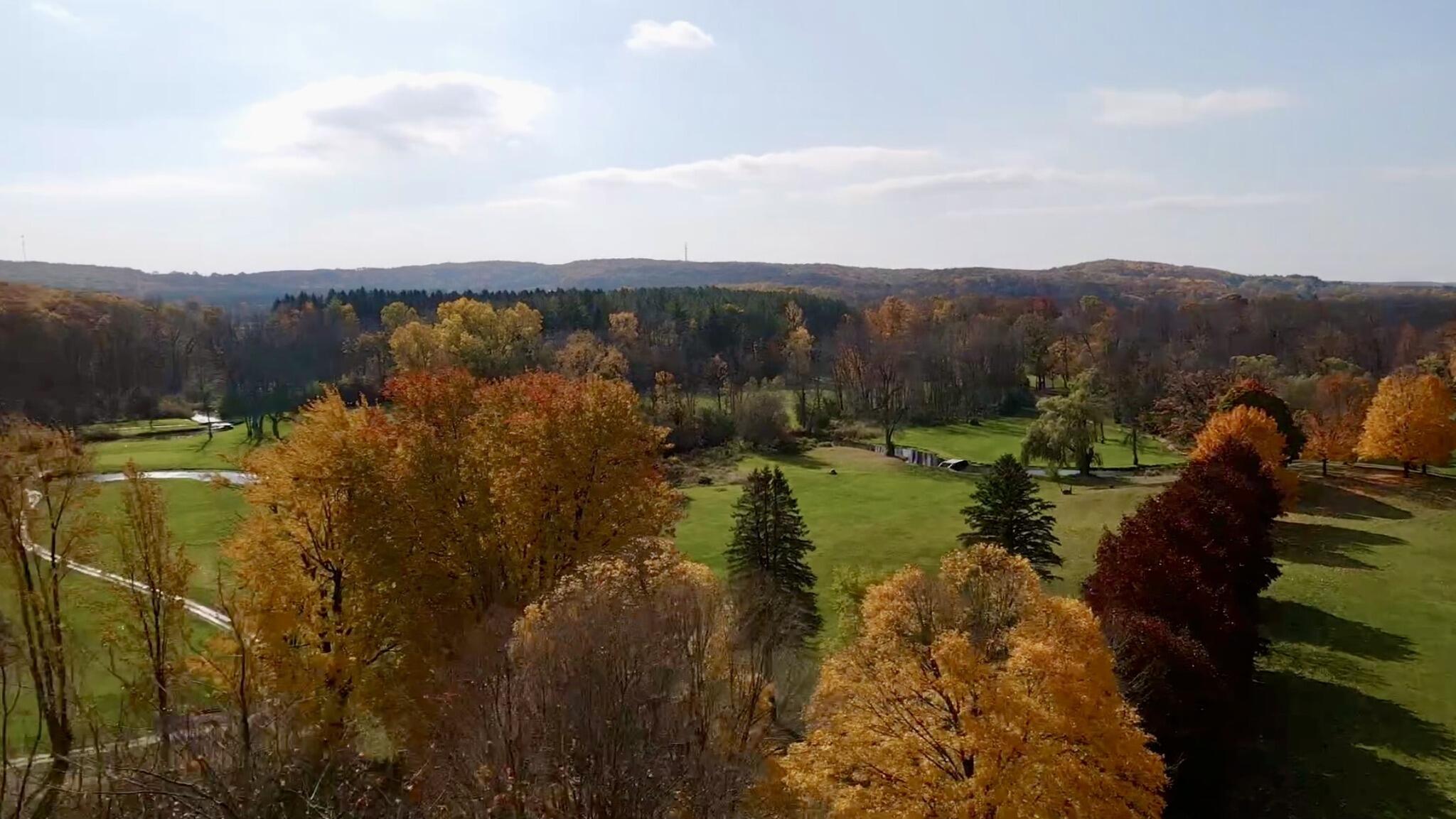 N7329 County Road CJ, Unit LT2 Rhine, WI 53073 - Photo 26 of 54 Crystal Lake golf course aerial fall