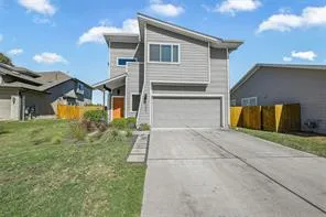a front view of house with yard