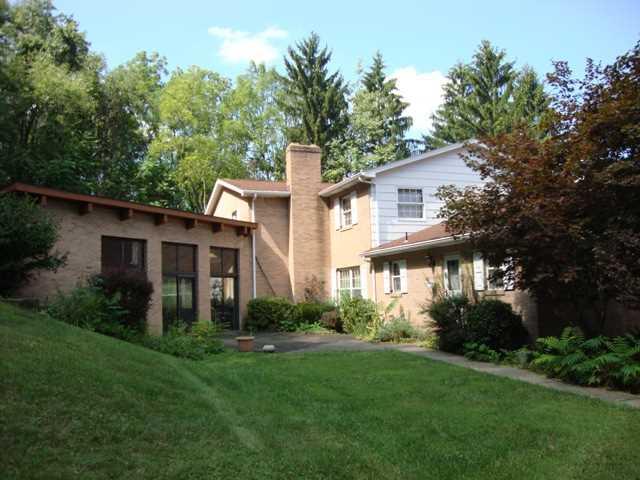 470 South Ben Franklin Road Indiana, PA 15701 - Photo 2 of 15 Exterior Back. Showing back patio area and enclosed in ground pool
