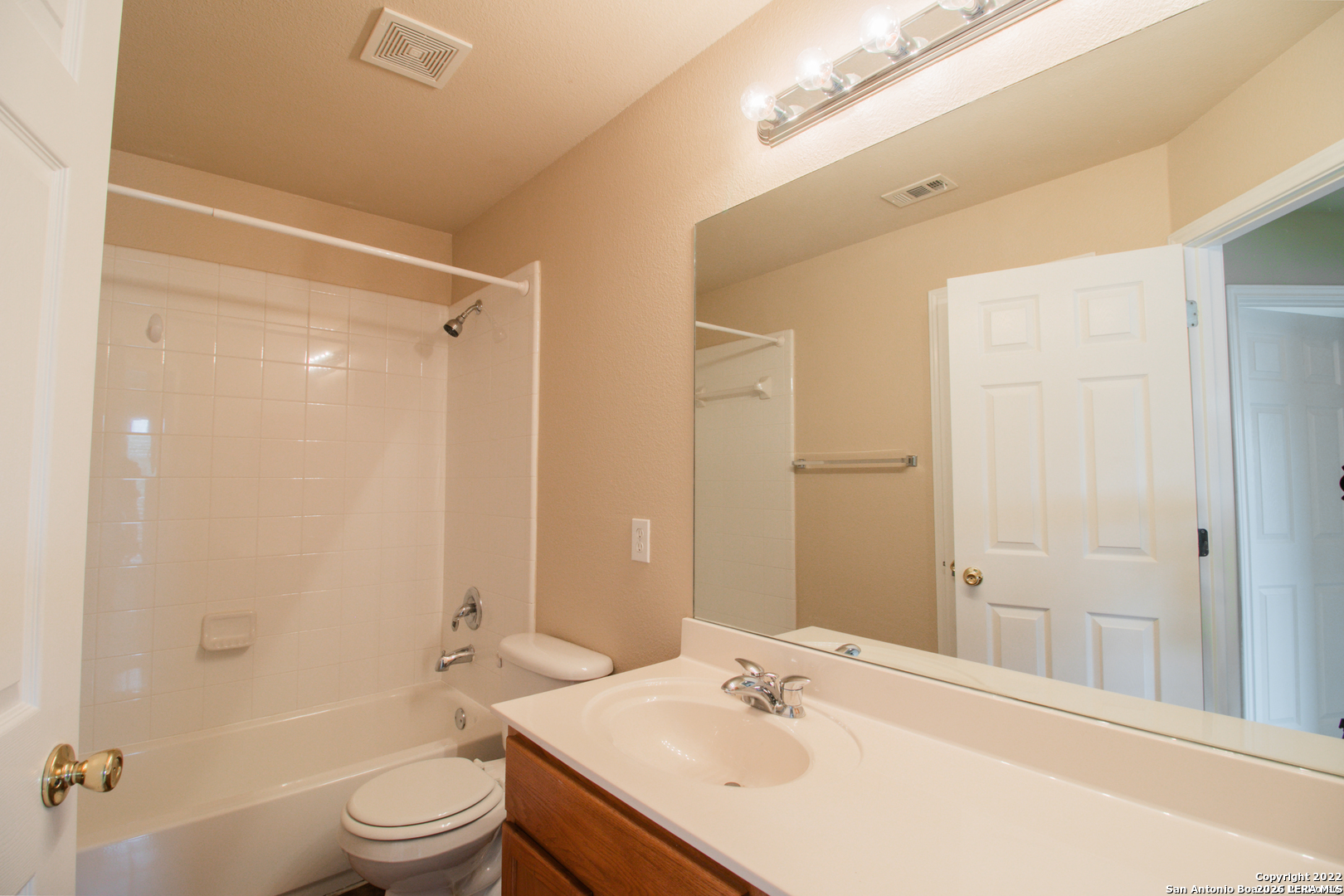 2621 Pillory Pointe Schertz, TX 78108 - Photo 22 of 25 a bathroom with a sink a toilet and shower