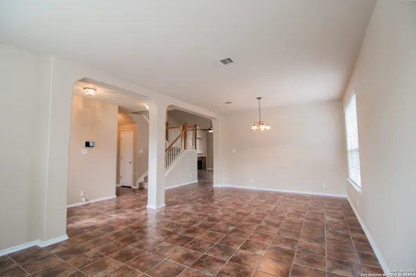 a view of a big room with closet and wooden floor