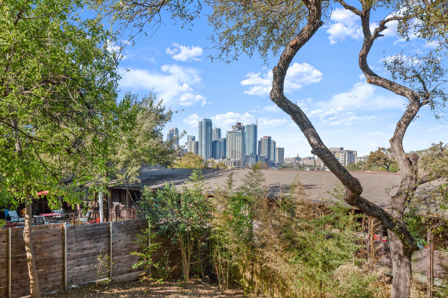 1406 Summit Street Austin, TX 78741 - Photo 5 of 32 a view of a yard in front of house