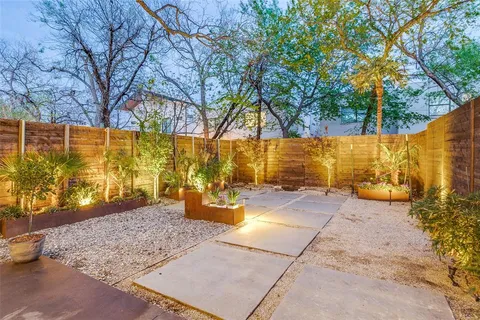 a view of swimming pool with an outdoor seating