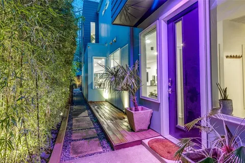 a view of a red door and chair